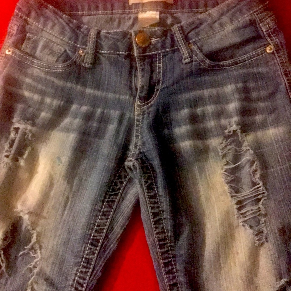 Here are some nice ripped jeans with bleached spots.